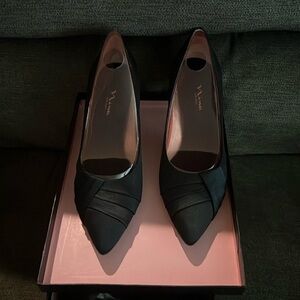 Nina’s satin 7.5 black heels. Gently used.